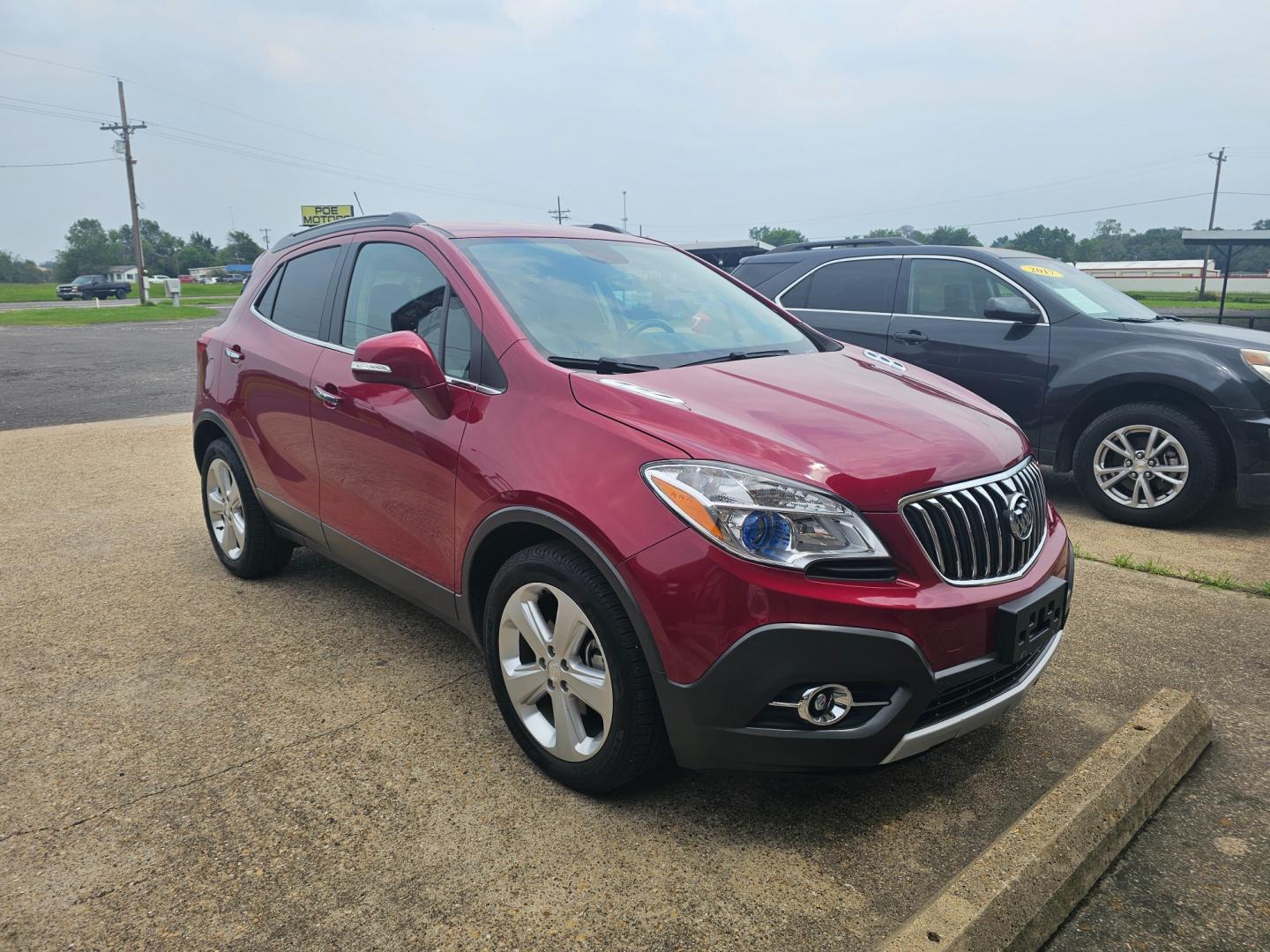 2015 MAROON Buick Encore Convenience FWD (KL4CJBSBXFB) with an 1.4L L4 DOHC 16V TURBO engine, 6-Speed Automatic transmission, located at 533 S Seven Points BLVD, Seven Points, TX, 75143, (430) 255-4030, 32.313999, -96.209351 - Photo#1